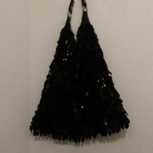 Shiny black handbag for evening wear.